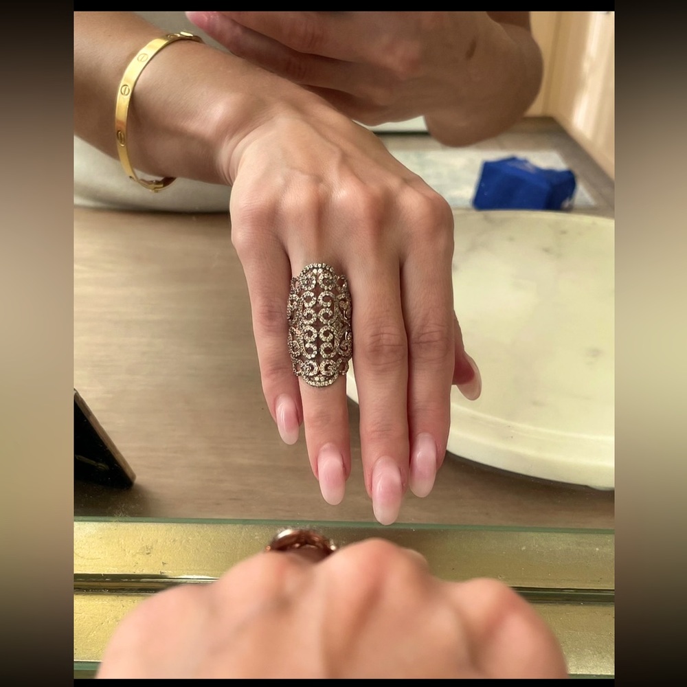 Beautiful rose gold (plated) and white sapphire ring.